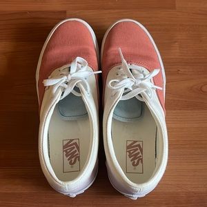 Pink, blue, cream, and white Vans sneakers